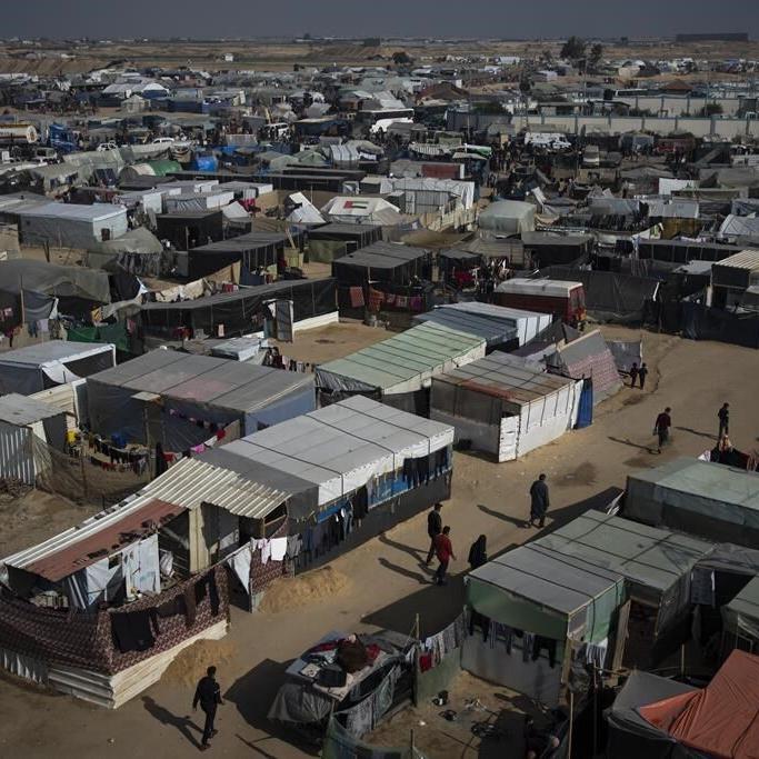 An Israeli airstrike hits a school sheltering people in Gaza, killing at least 30 including children